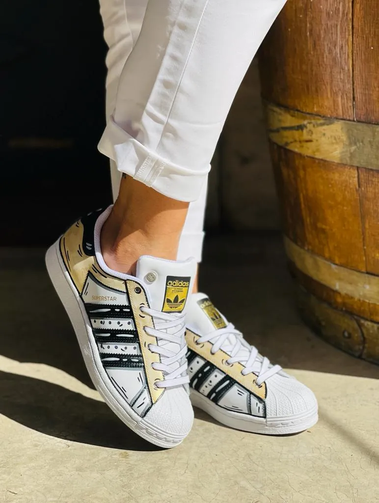 Adidas Superstar Cartoon Gold e lacci cartoon