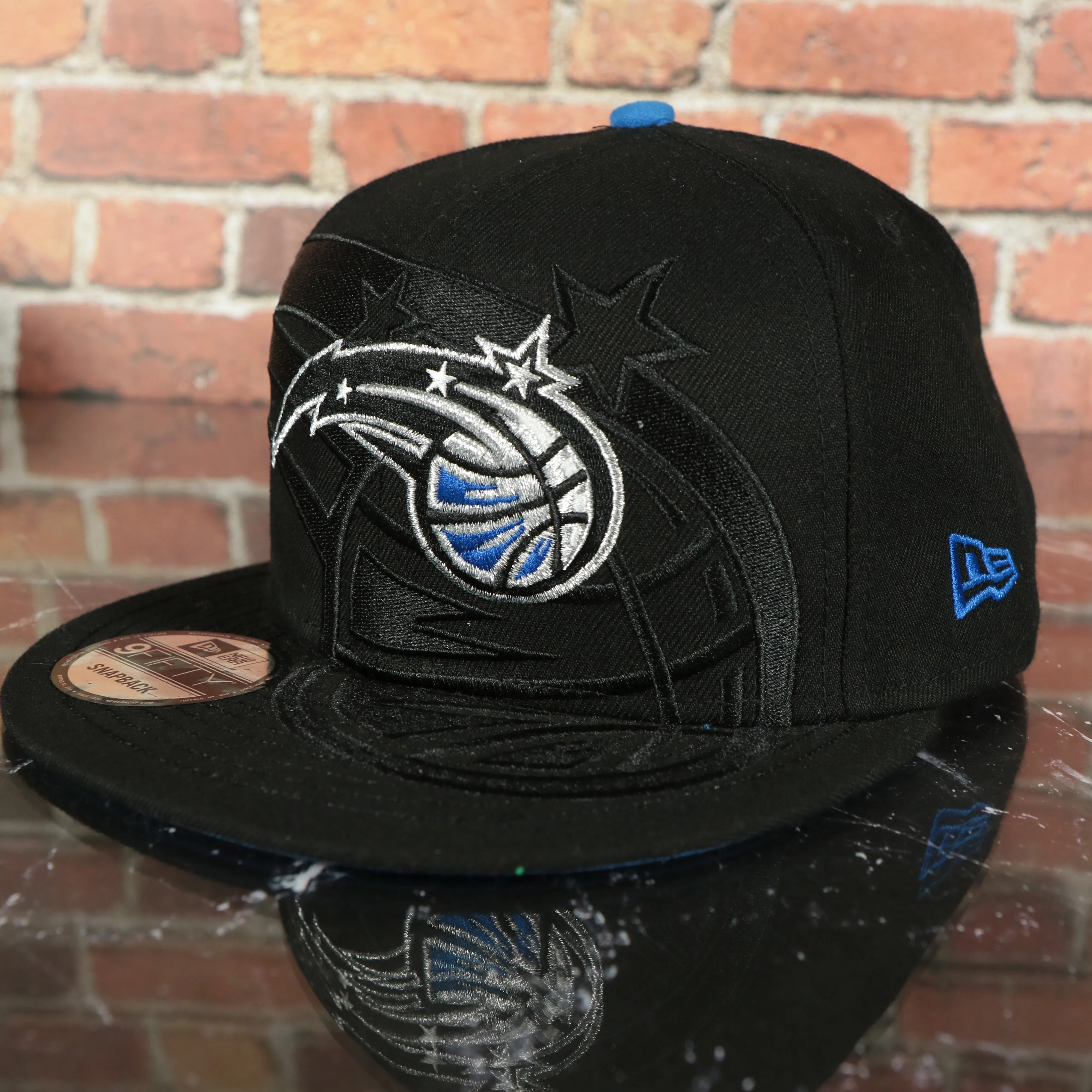 Orlando Magic Logo Spill XL Outline New Era 9Fifty Snapback Hat